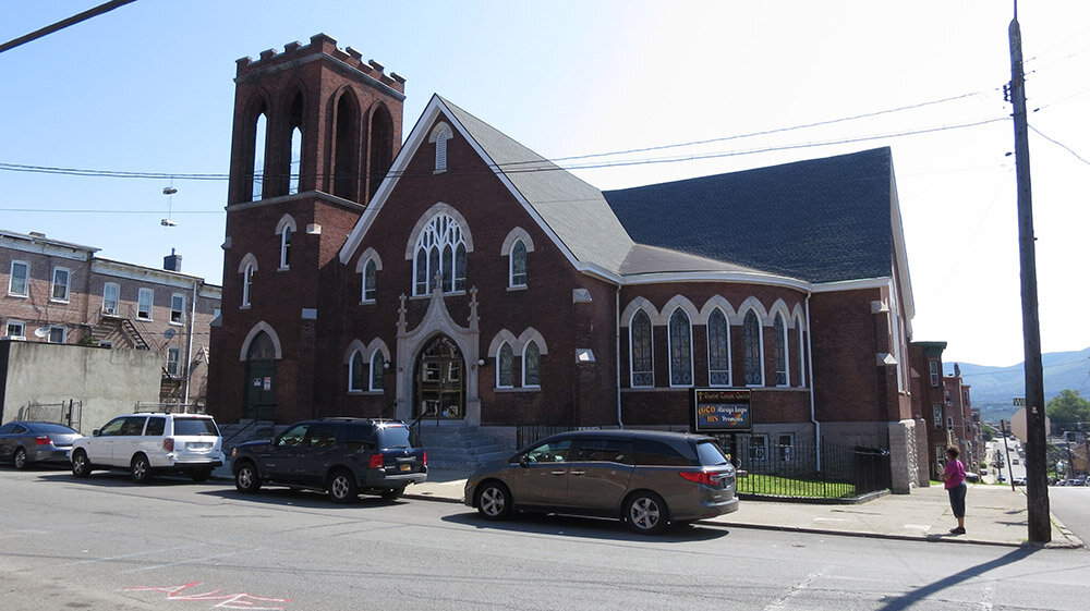 Completed in 1890, The Baptist Temple Church retains historic finishes, fixtures and stained-glass windows.